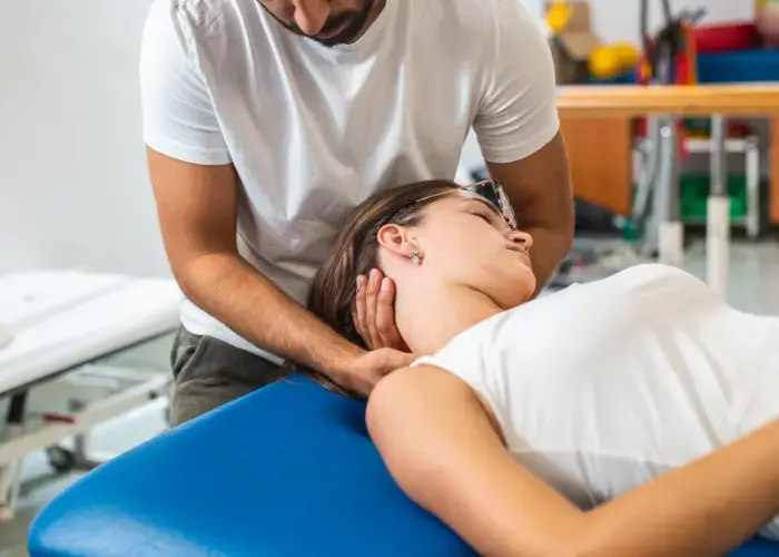 lady having neck pain physiotherapy